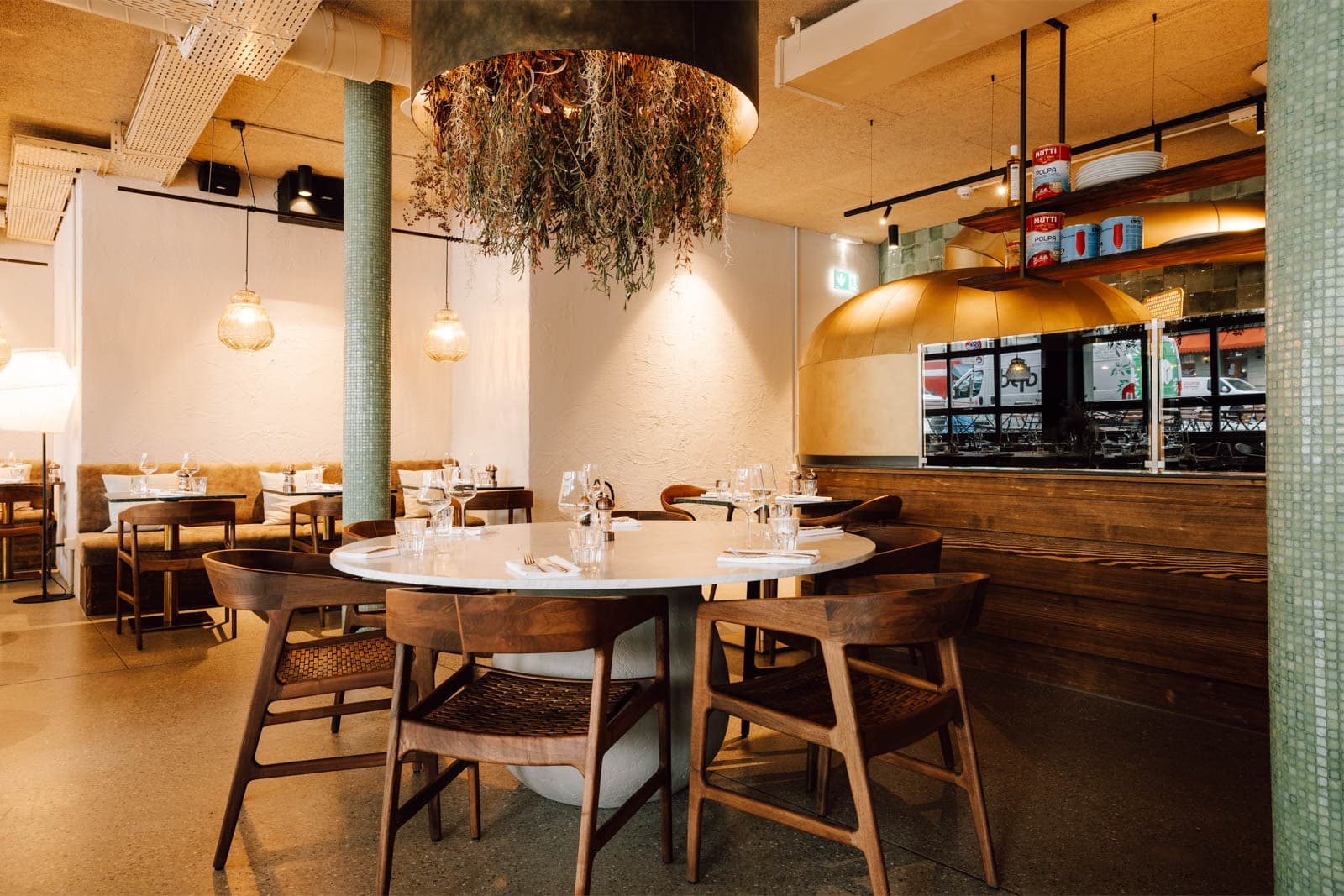 Olive restaurant — artistic lounge with portrait gallery